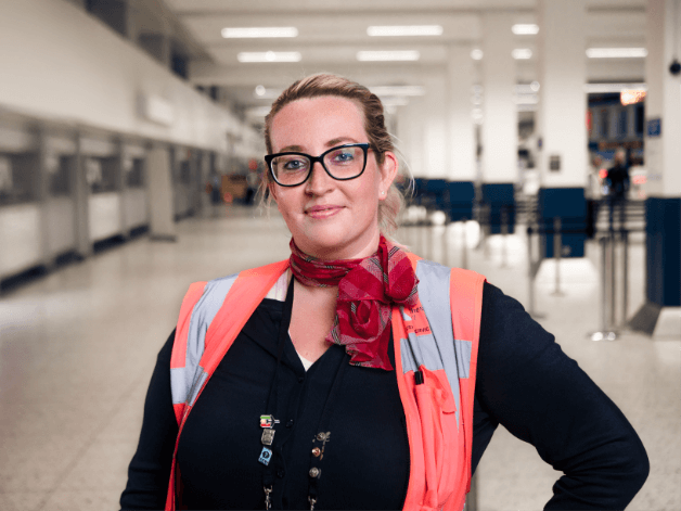 Empowered airport worker captured as part of the Return to Travel campaign by photographer Chris Curry