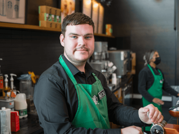 Starbucks staff portrait photography captured at Manchester Airport by freelance photographer, Chris Curry