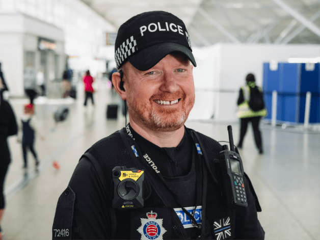 Portrait photography of a British police office captured at Stansted Airport