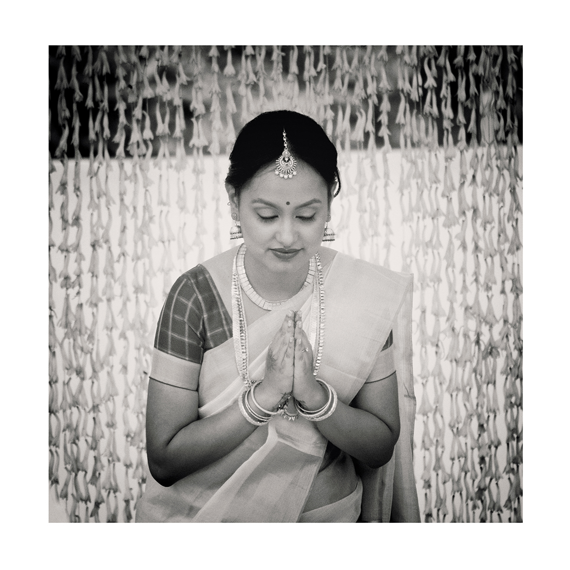 Aditi in prayer Low rez Ali Warner Photography weddings Holidays commissions.jpg