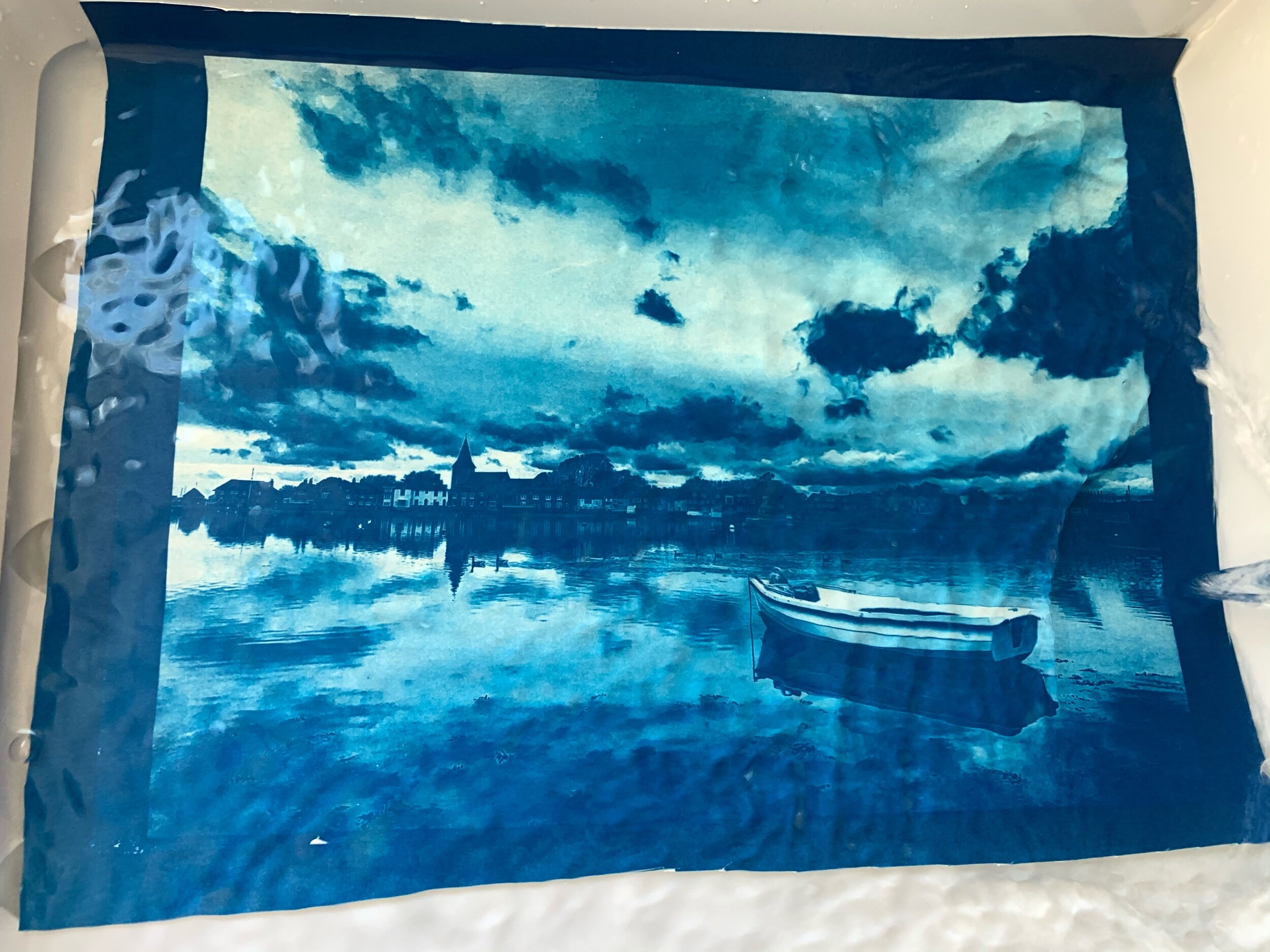 Final wash of a cyanotype. Bosham Creek 2021 by Ali Warner.