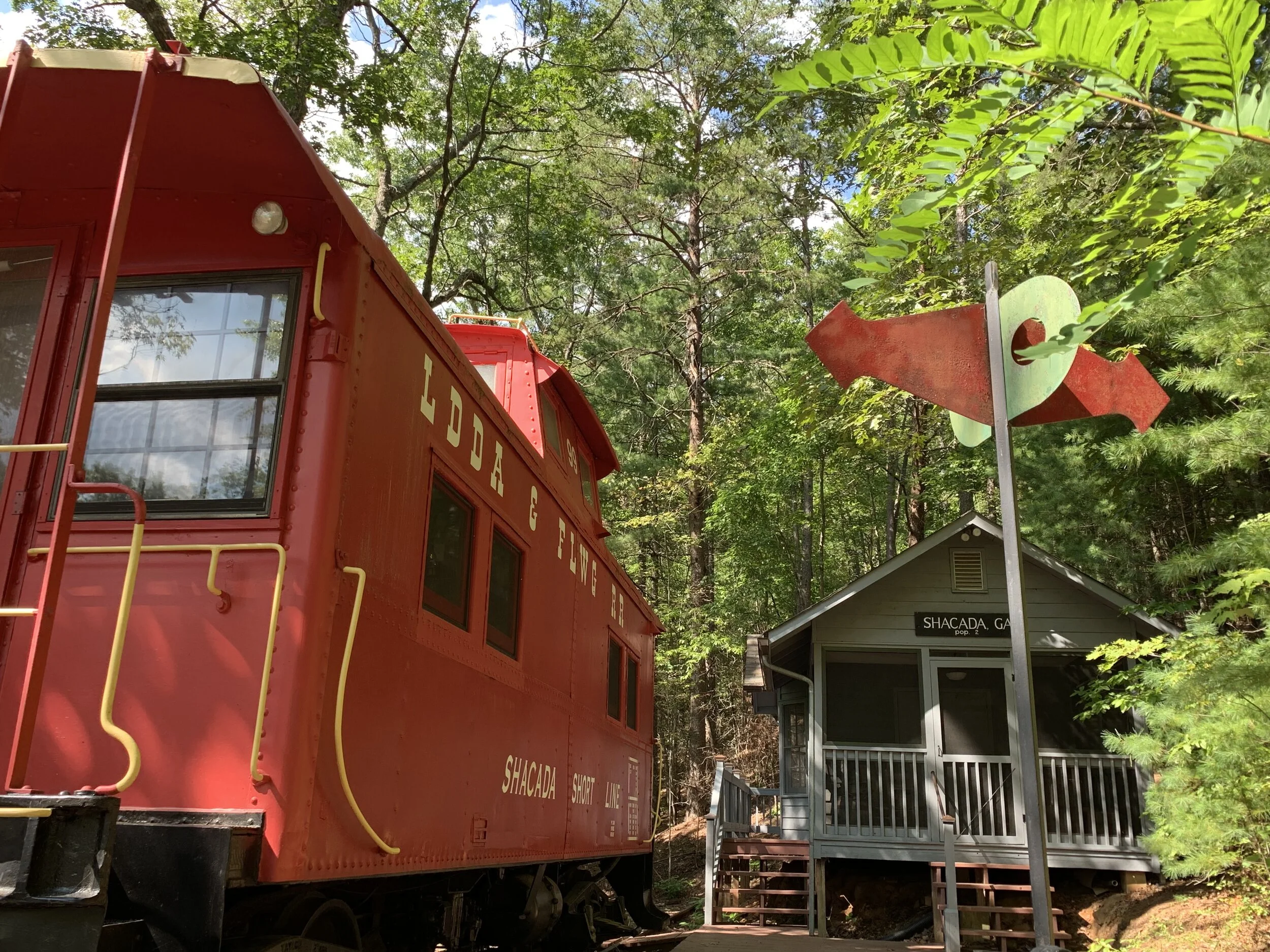 The Caboose and Station House — Mountain Caboose Lodge