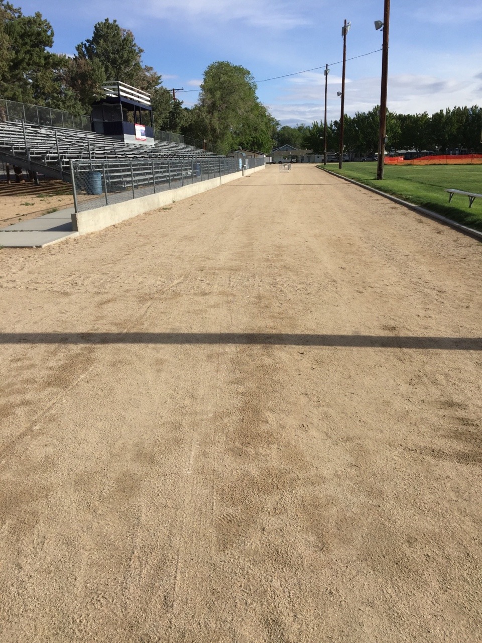Robin was so shocked to see a dirt track, she forgot to take a picture of the scenic mountains behind it. (She ran her very first race on a dirt track at age 12.)