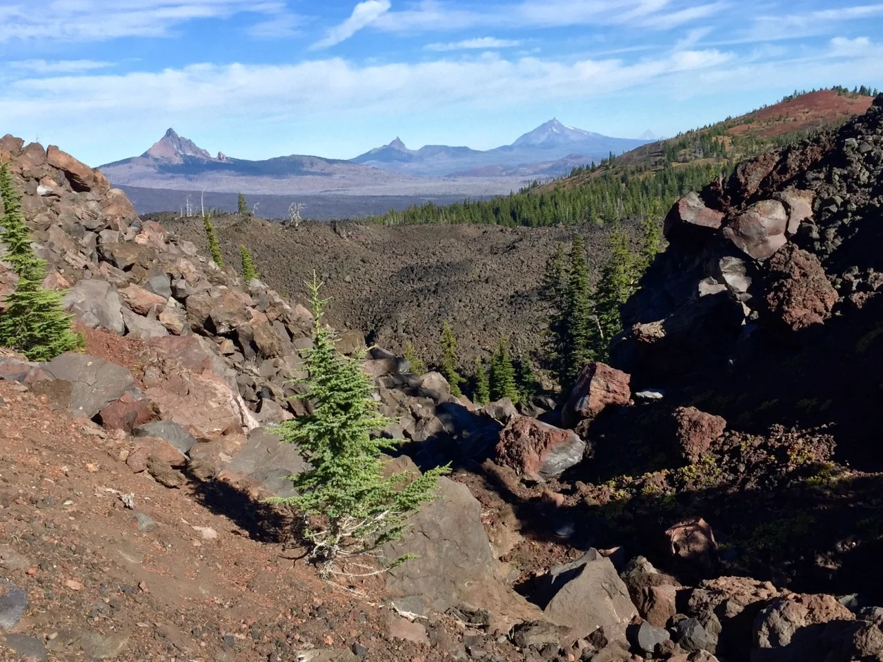 From left to right: Mt. Washington, Three Fingered Jack, Mt. Jefferson, and Mt. Hood

via https://dayone.me/2csJzuC