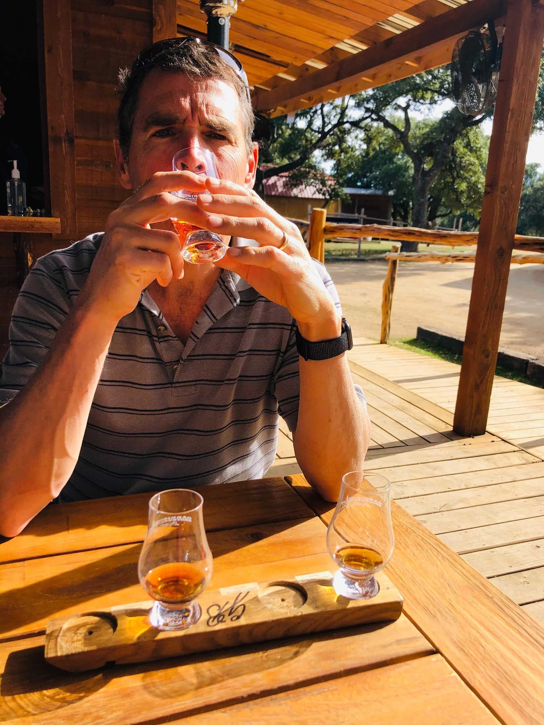 Enjoying a bourbon tasting at Garrison brothers distillery.