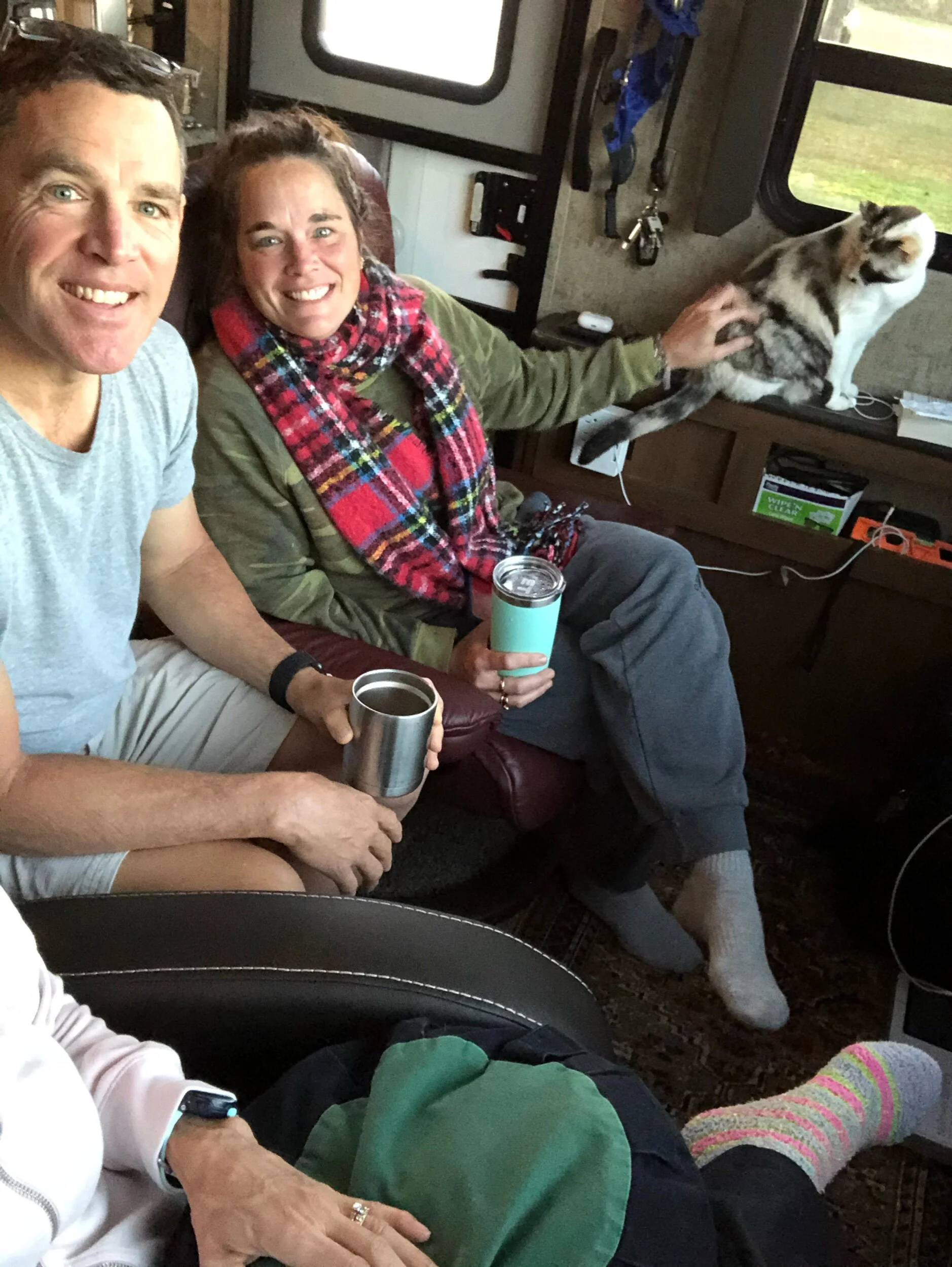 Cozy camper coffee time with sister Robin.
