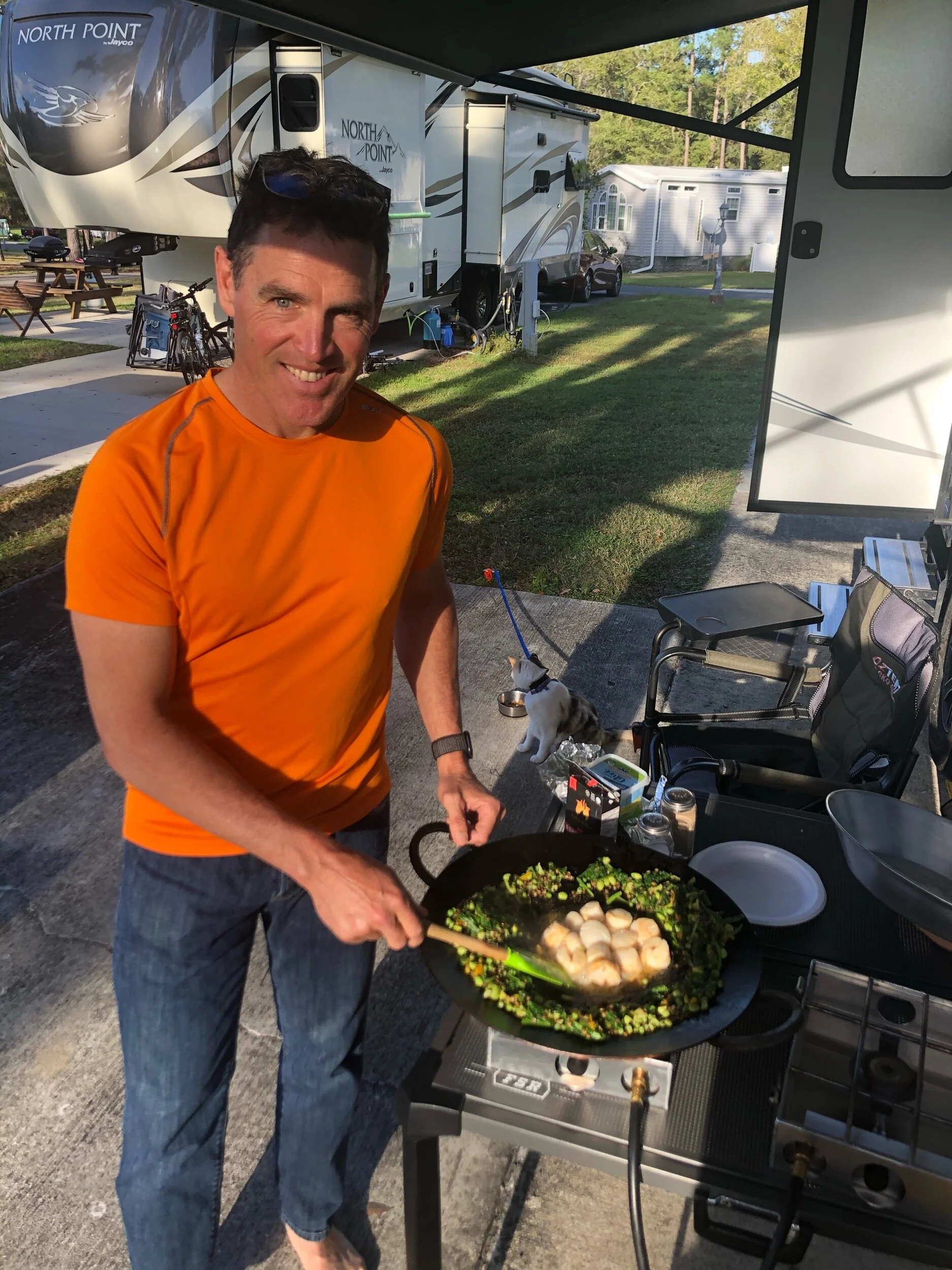 Sautéed scallops and greens. Note the sous chef in the background.