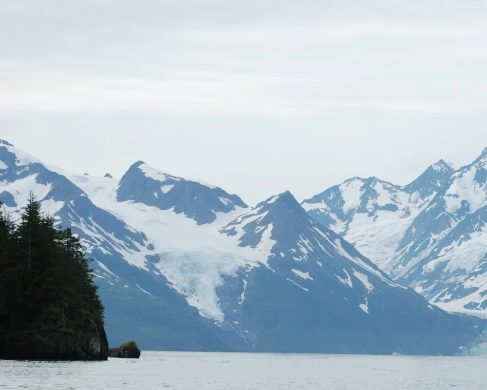 VALLEY GLACIERS flow out from mountain glaciers, ice fields, or ice sheets, and are contained and channeled by a valley.