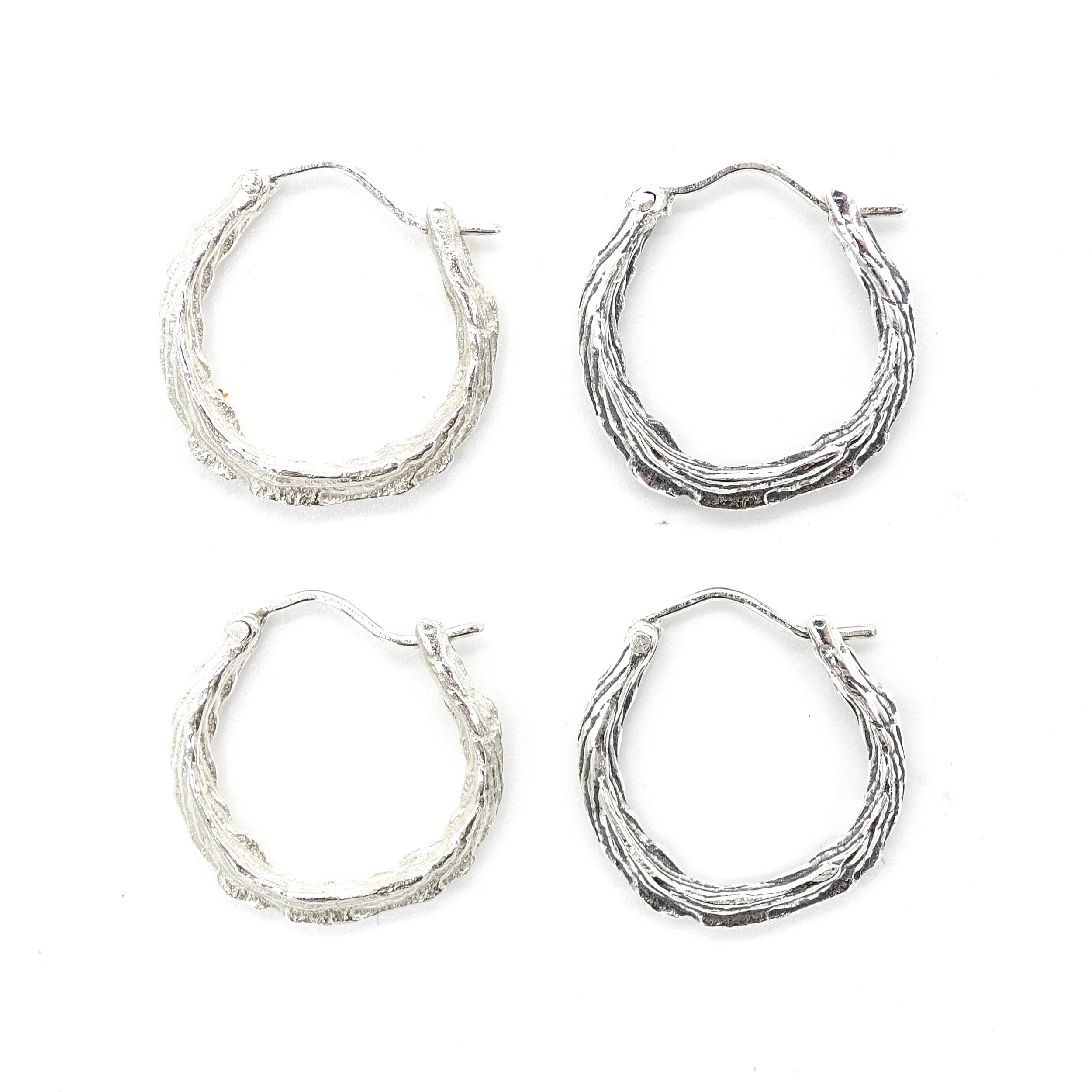 Clean and Oxidised bone hoops group.jpg