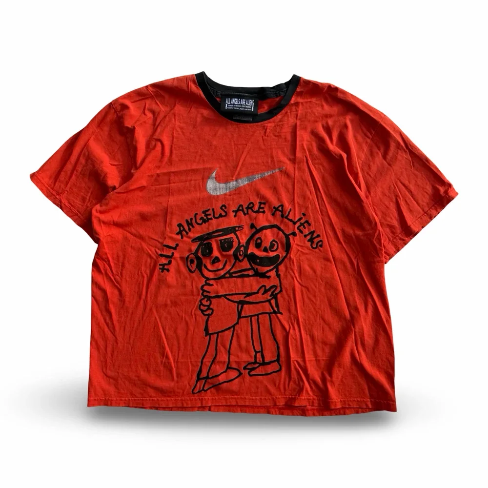 made-in-aus-orange-hugging-vtg-tee-xxl.webp