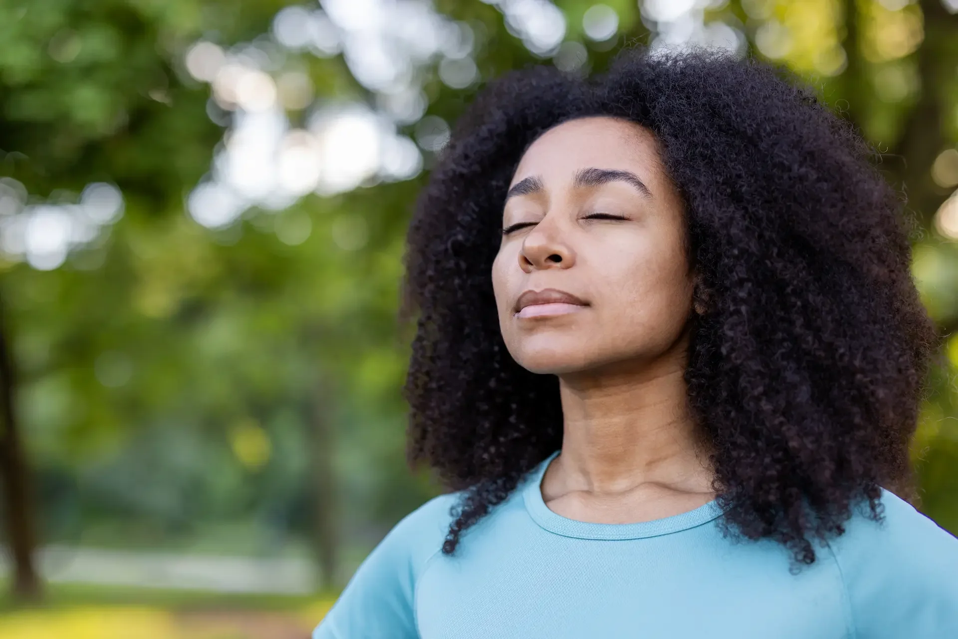 woman with high-functioning anxiety taking deep breath