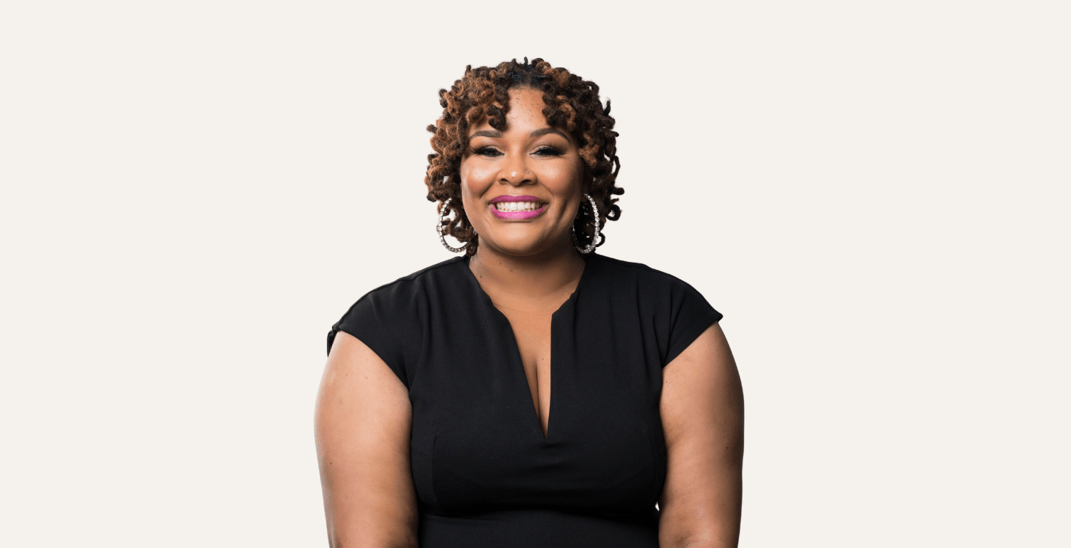Stacy Crawley transformational coach speaker and author smiling warmly in black top