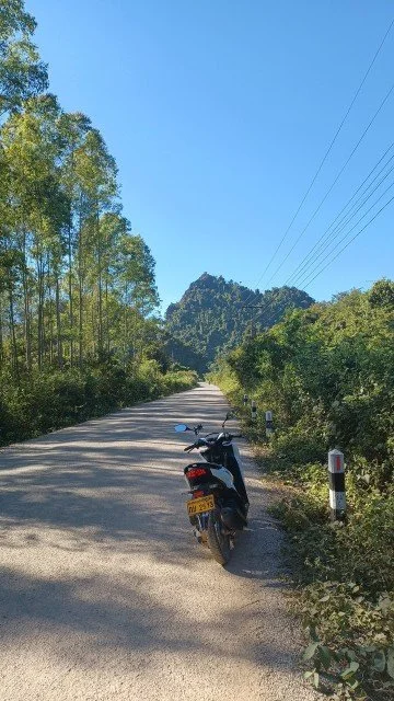 Nicole Scooter Trip Laos KET Kids English Thailand.jpg