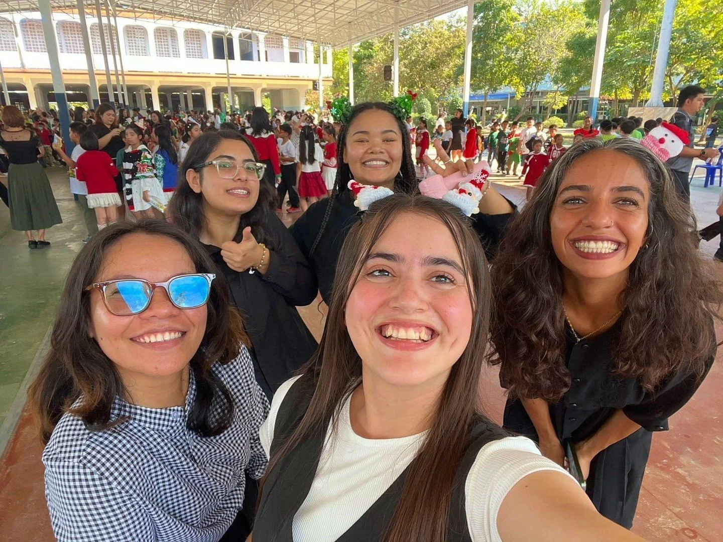 Here&rsquo;s a joyful group selfie from the heart of the Christmas celebration at school! 

Our fabulous teachers, Teacher Moon, Mary, Tojan, Requal, and Ashba, brought all the festive energy and smiles to the Christmas event!  Surrounded by hundreds