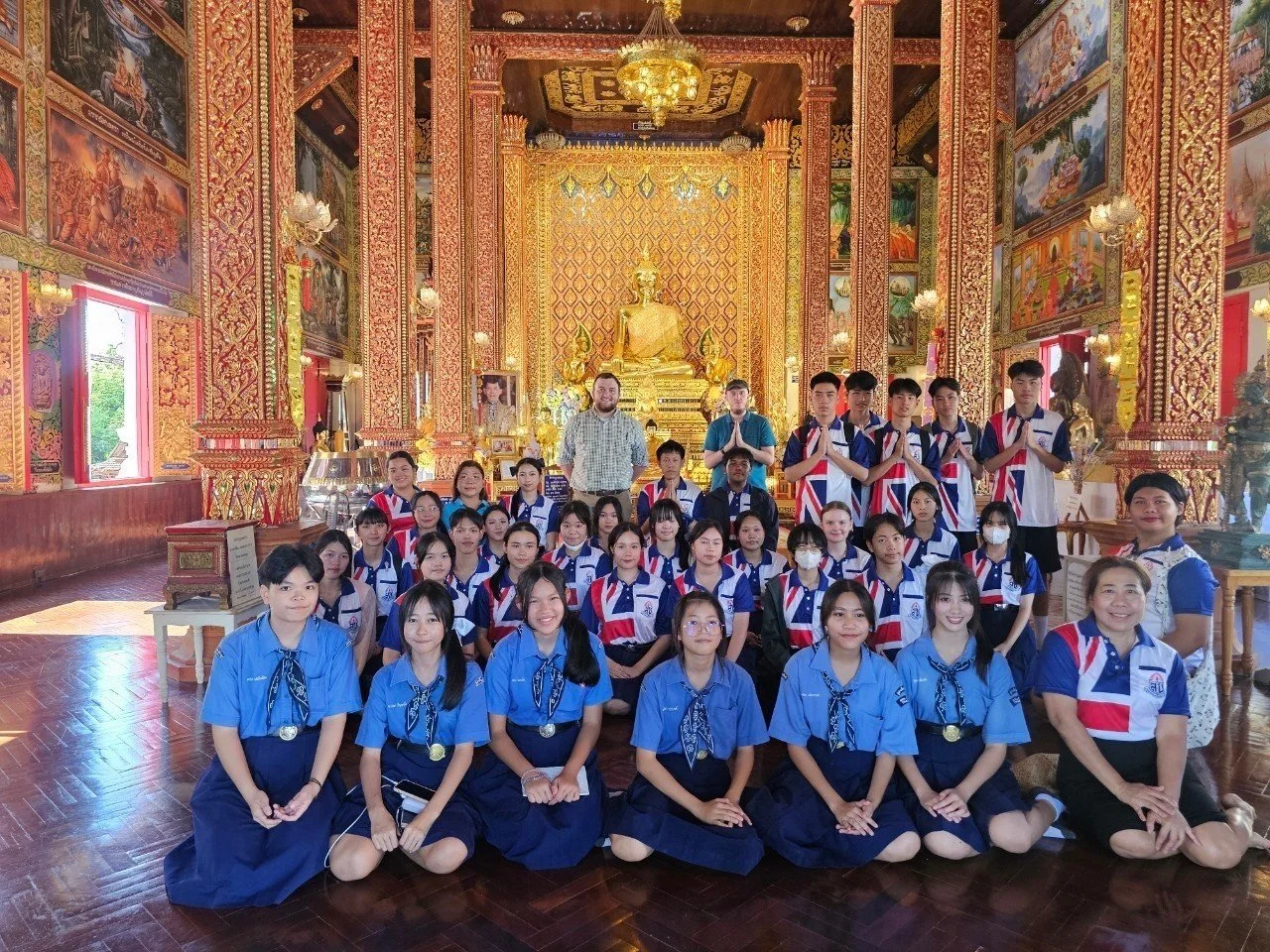 KET teacher and his students during a school trip in Thailand.