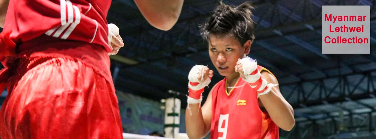 May Thazin Htoo faces Shwe Ko Lay in the finals of the Golden Belt Championship on July 13, 2019. Photo courtesy of Myanmar Lethwei Collection .