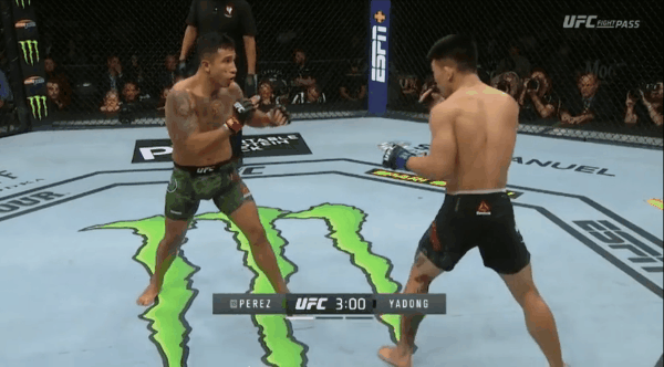 Alejandro threw a naked inside leg kick without a set up and his hands down. Yadong saw it coming from a mile away and that’s where he shines, using his amazing reflexes and his money right hand. Song’s power is a problem. When Alejandro’s kick conn…