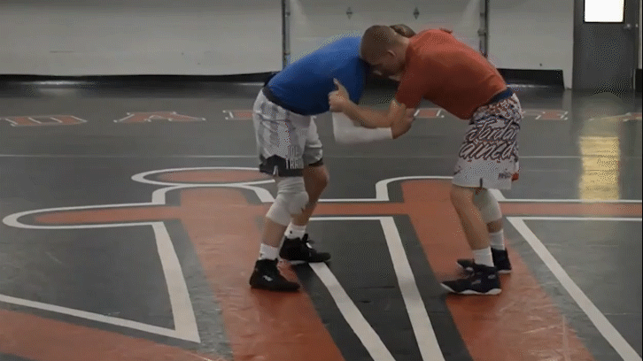 Coach Jordan demonstrating the Chase the Ankle finish off a right arm elbow bind.
