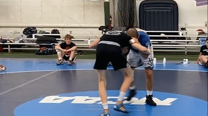 Coach Jordan demonstrating the Cut-Back finish. Notice how Jordan takes a big step with his left foot to perform the pivot/direction change, which ultimately forces the opponent to his left hip.