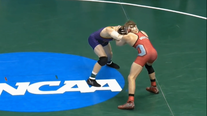 Bo Jordan transitions from an ankle pick to a front trip off an inside Armpit Lock. This is a good example of how other techniques, besides the single leg, can connect with the JTSLS.