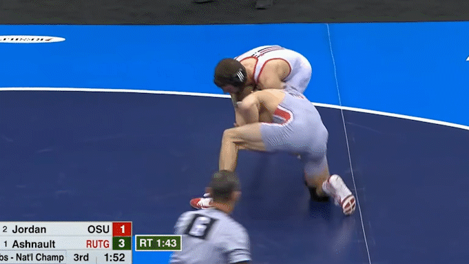 Micah Jordan executing the Split the Middle finish in the 2019 NCAA Championship title match .