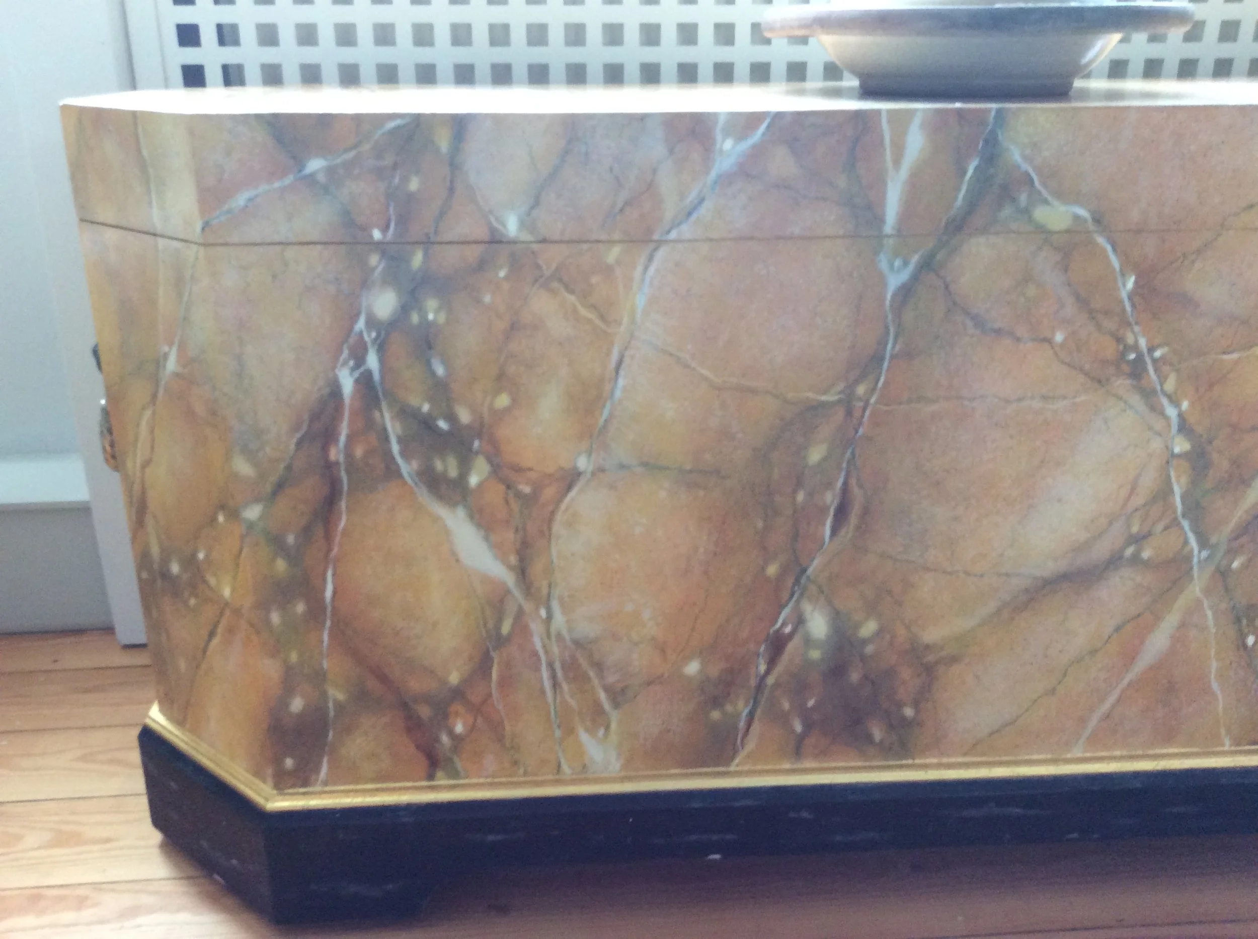  Detail of “faux” yellow marble on wood. 