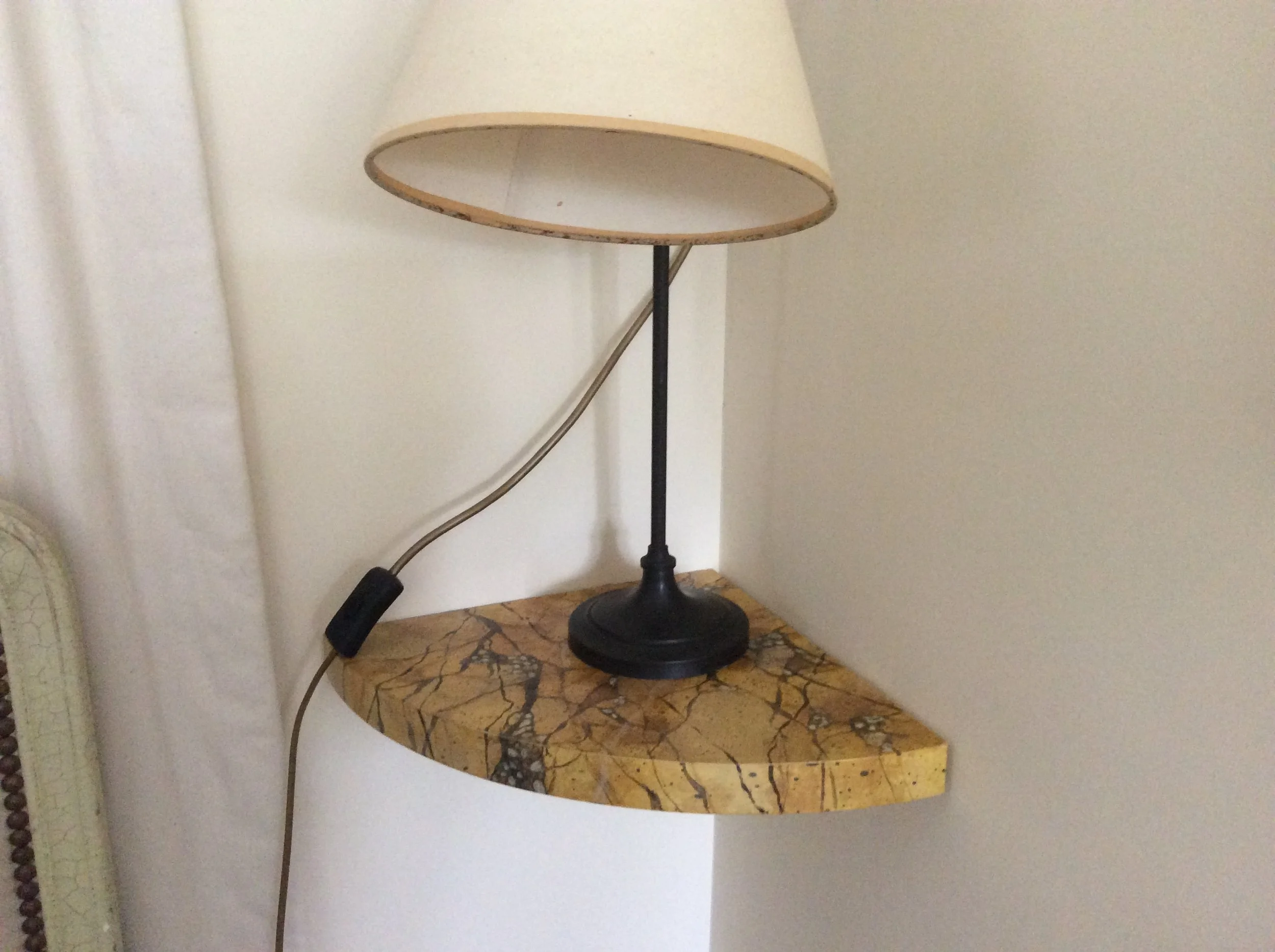  Marbled top to radiator-cover and corner wall shelf. 