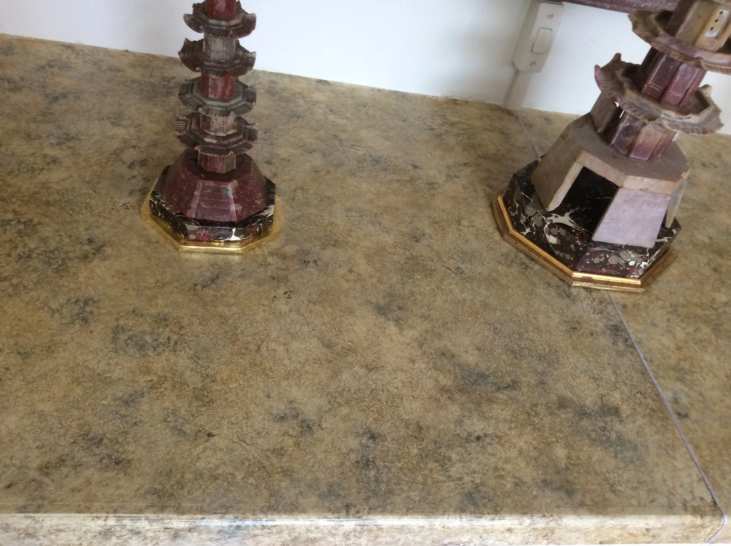  Tops to units in painted slate and marble. 