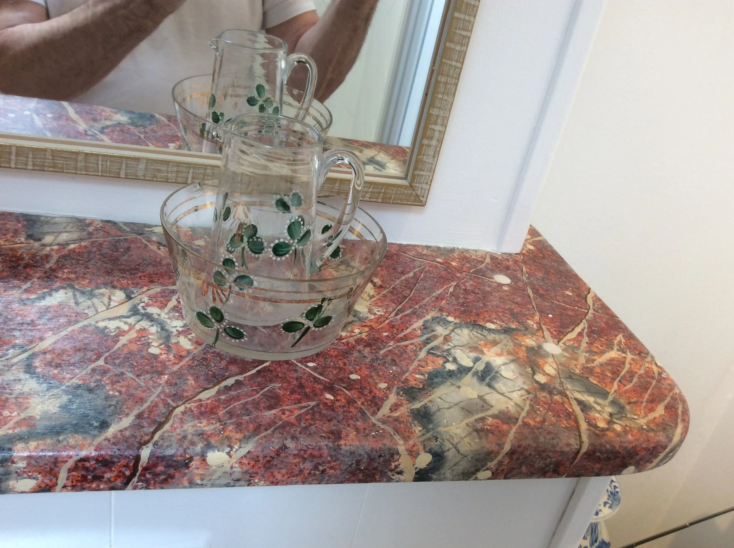  Tops to units in painted slate and marble. 