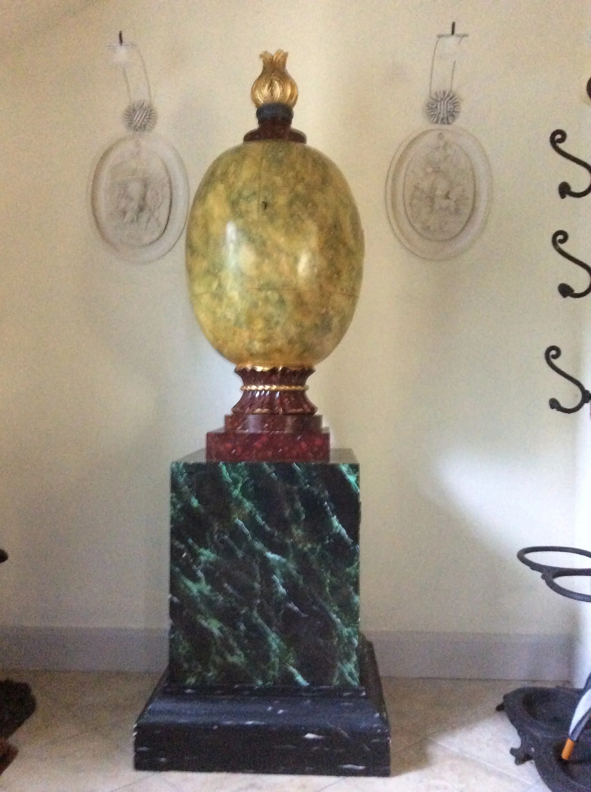  Wooden “egg-cupboard” painted in “faux” yellow-sienna and sea-green marble. 