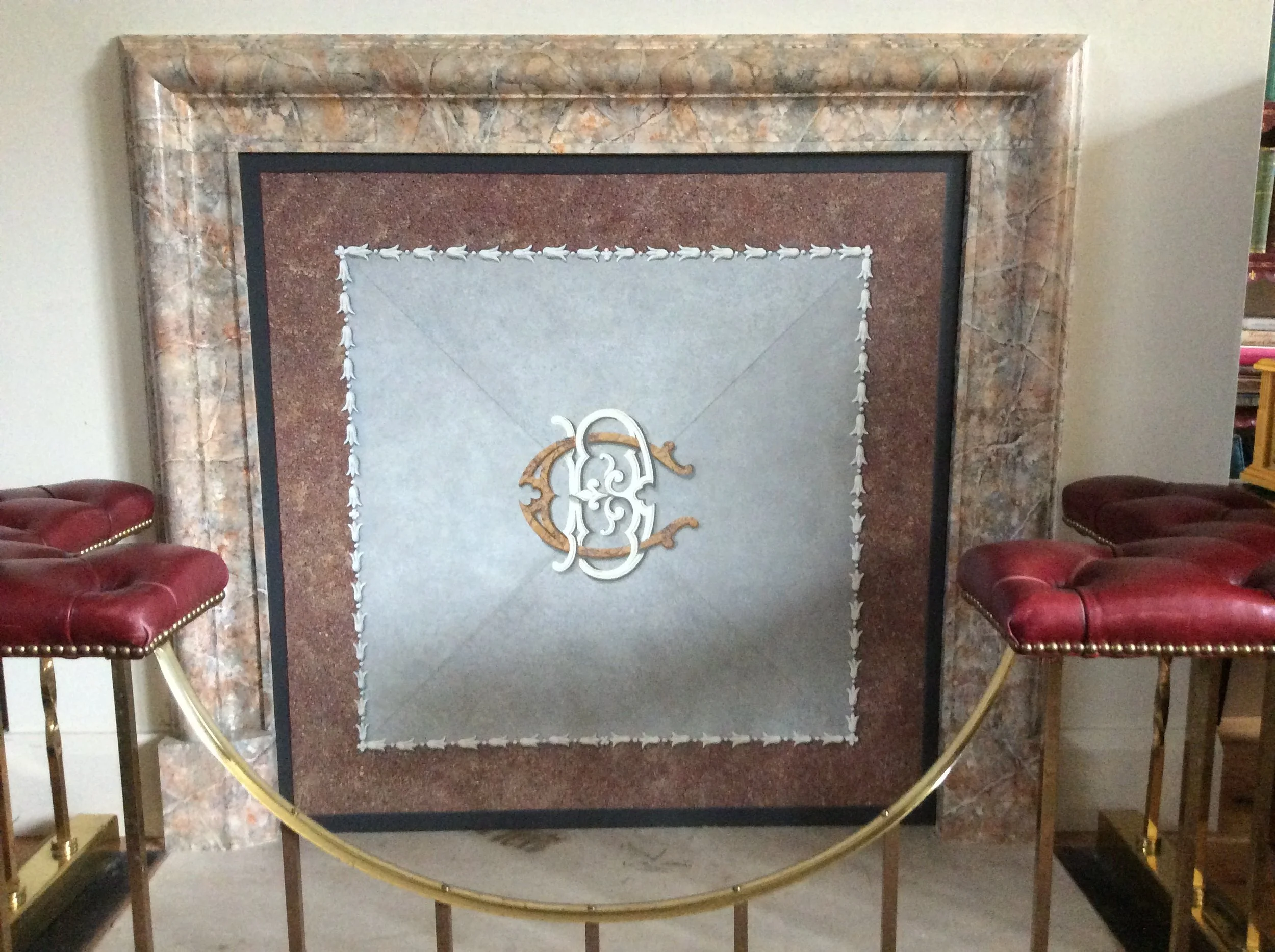  Marbled wood chimney breast and painted chimney board as porphyry and slate, with initials. 