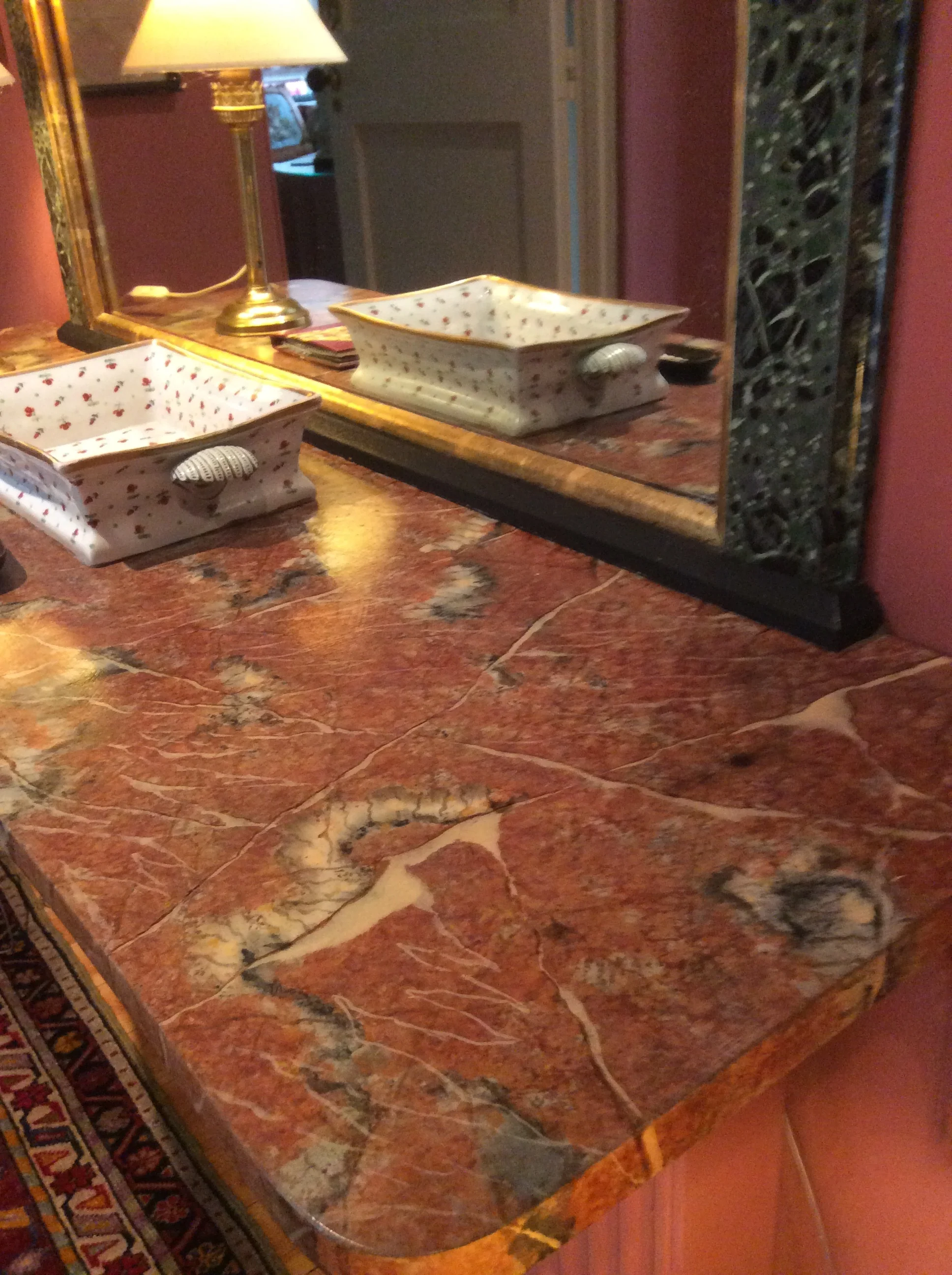  Wooden top to console and mirror frame, marbled and gilded. 