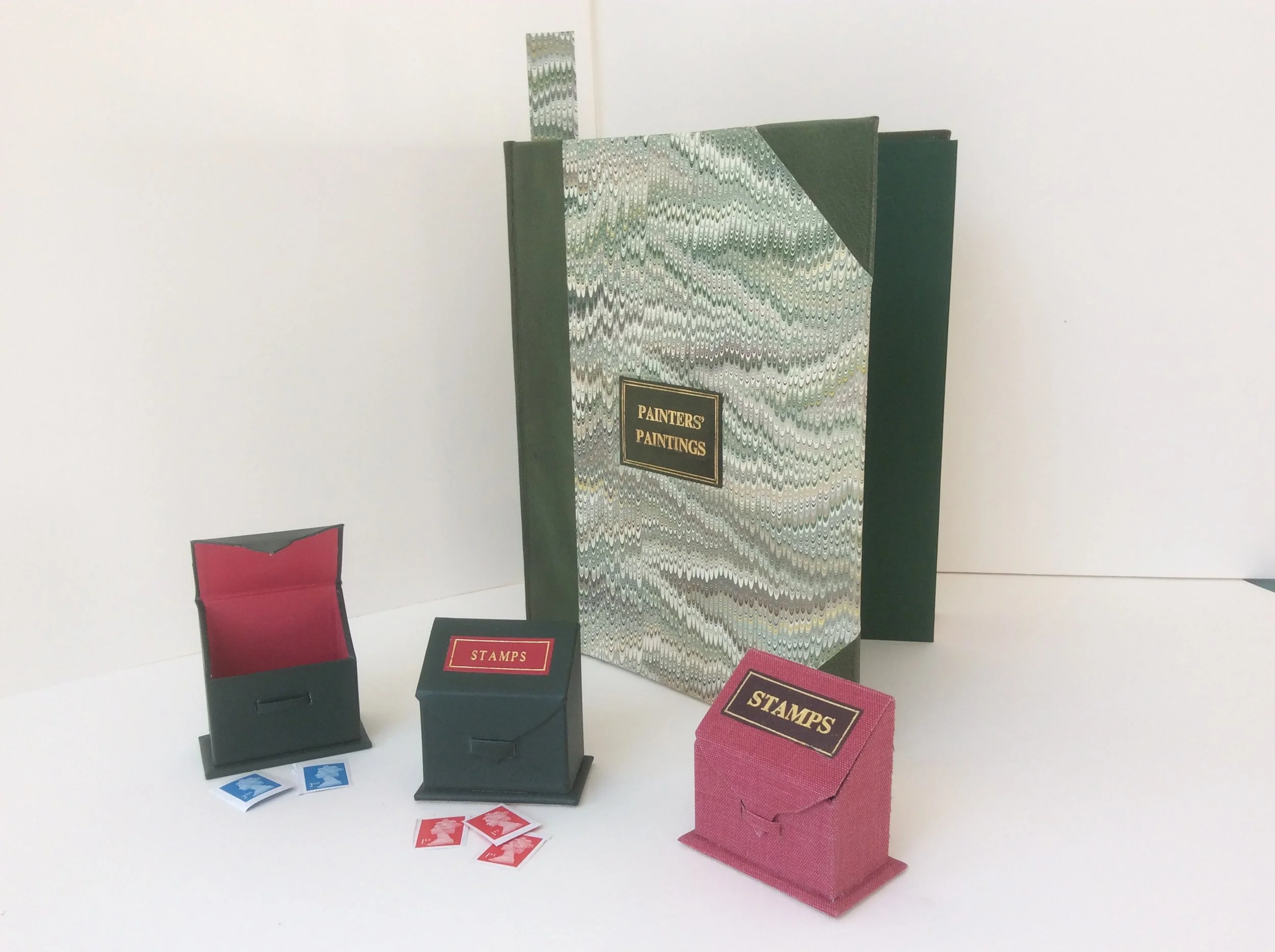  Small boxes for keeping postage stamps. 