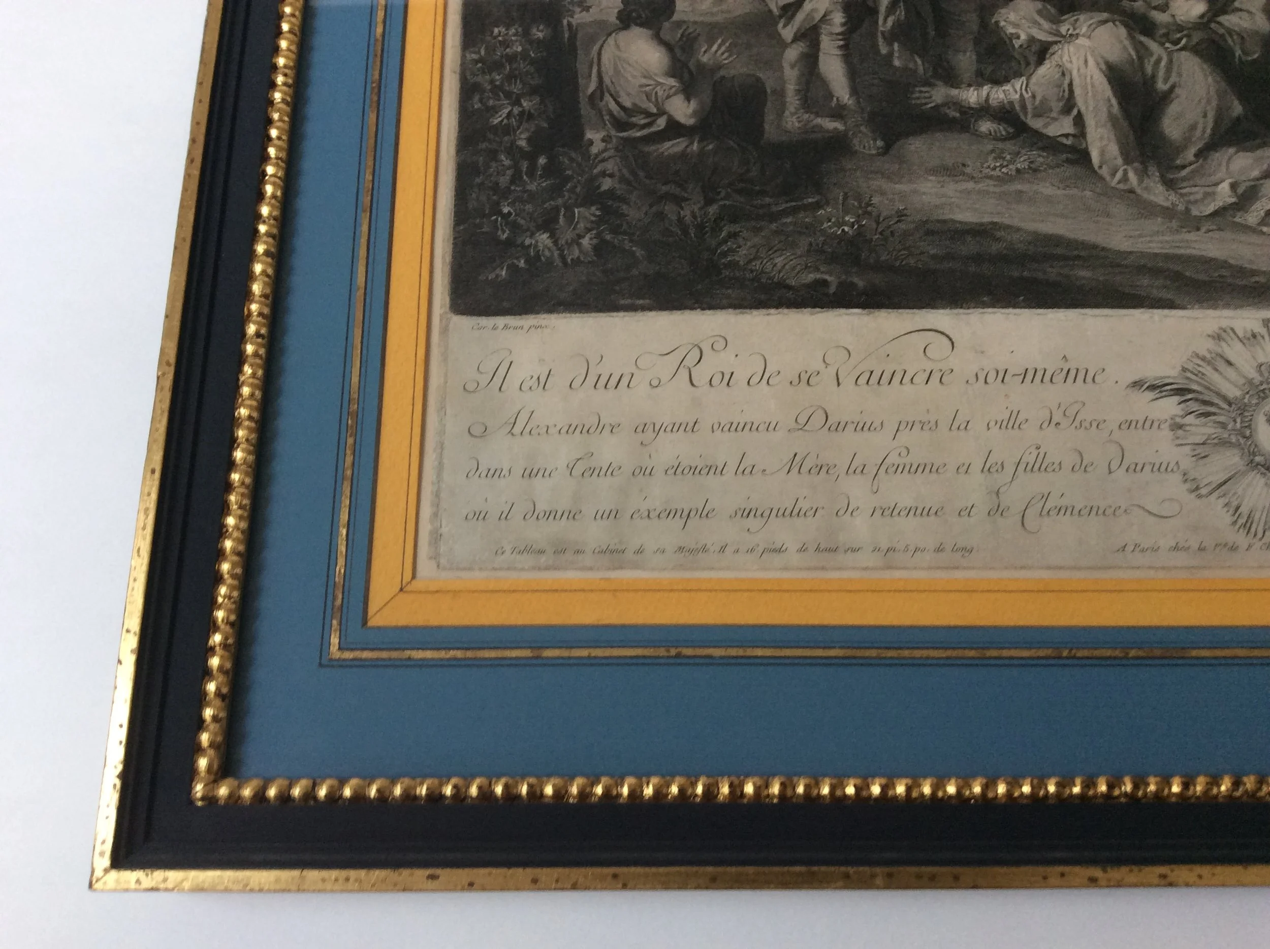  Wood Frame. Painted and gilded. Mount with coloured paper sections. 