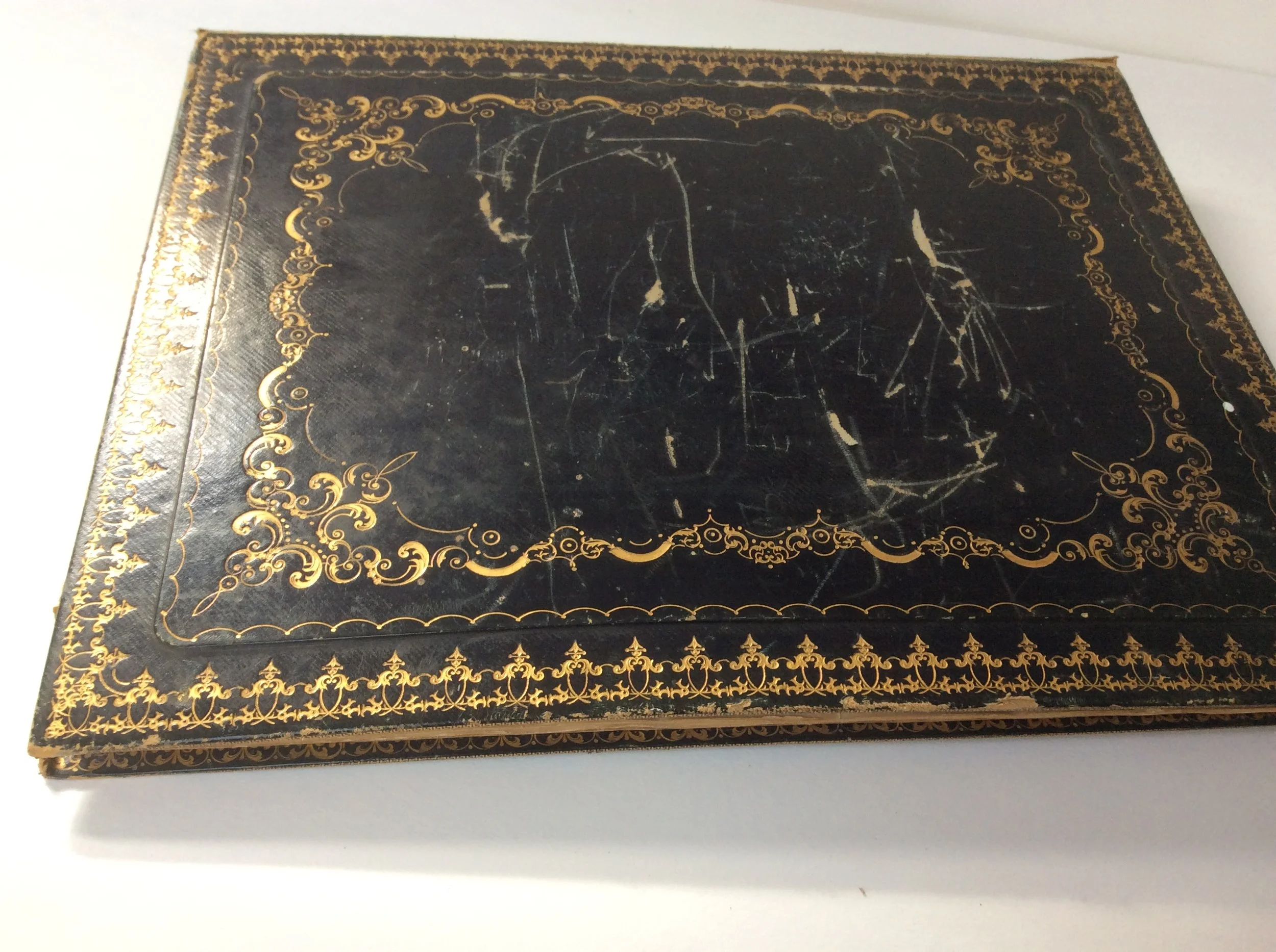  Restoring and re-backing damaged albums. 