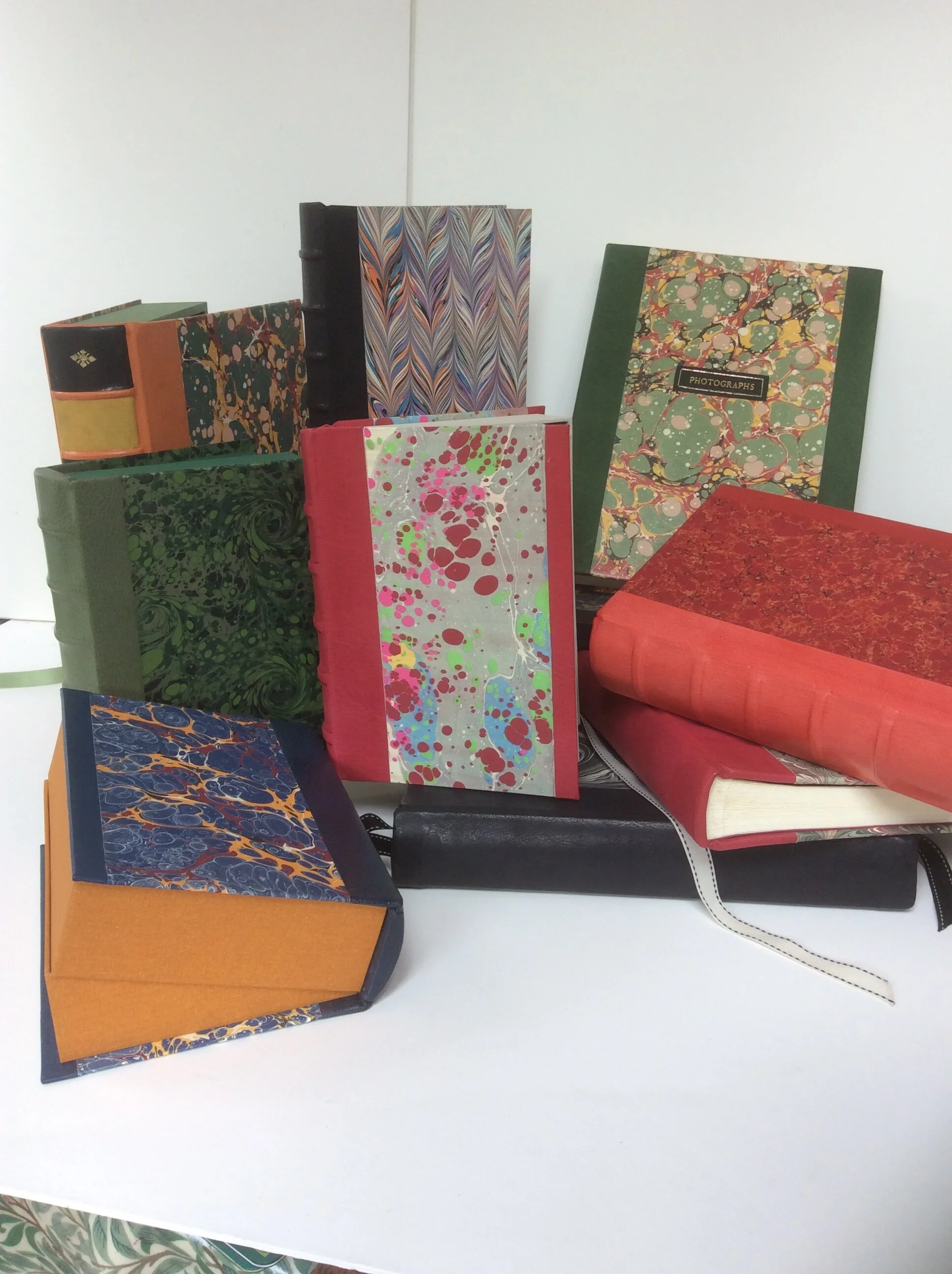  Half and quarter Leather drop-back ( “Clam-Shell“ ) boxes 