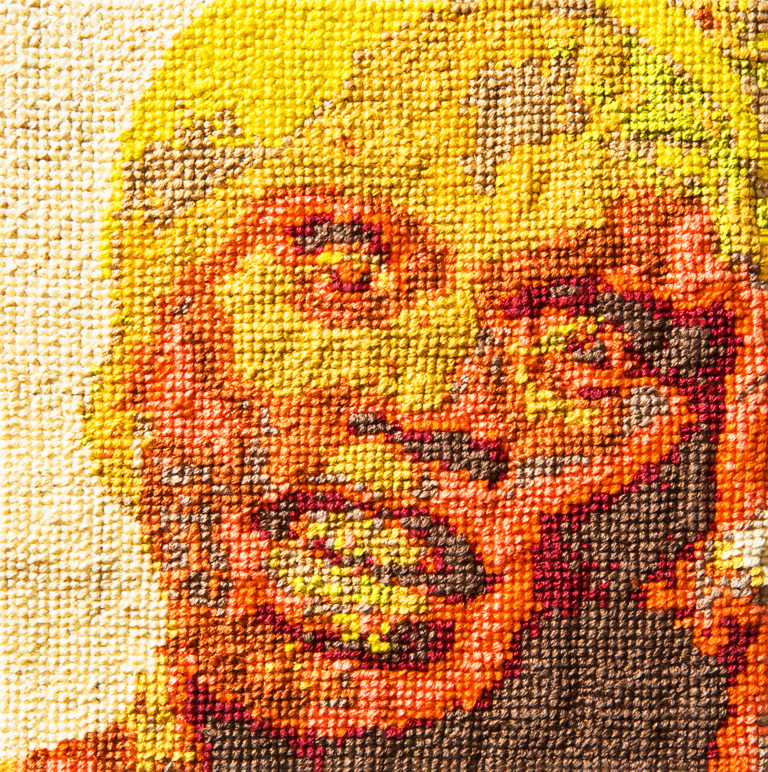   Frame 33   By Christina León and Hester Starnes  5 x 5 inches  Cotton thread on aida cloth  2013 