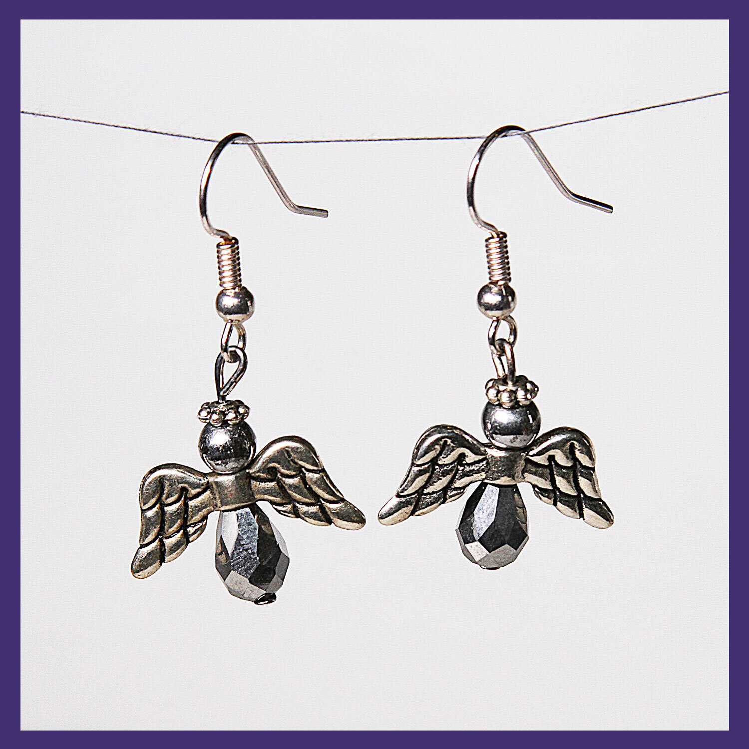 Silver with Silver Angel Earrings