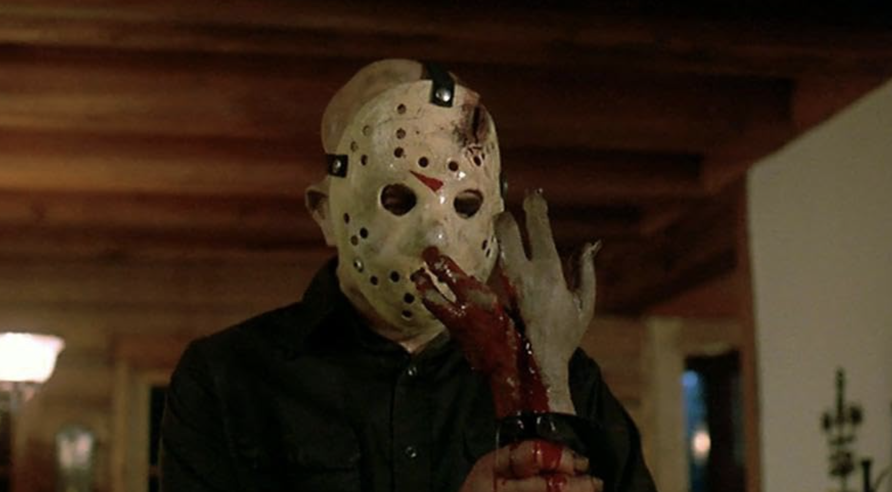 Jason Voorhees studies his bleeding hand.