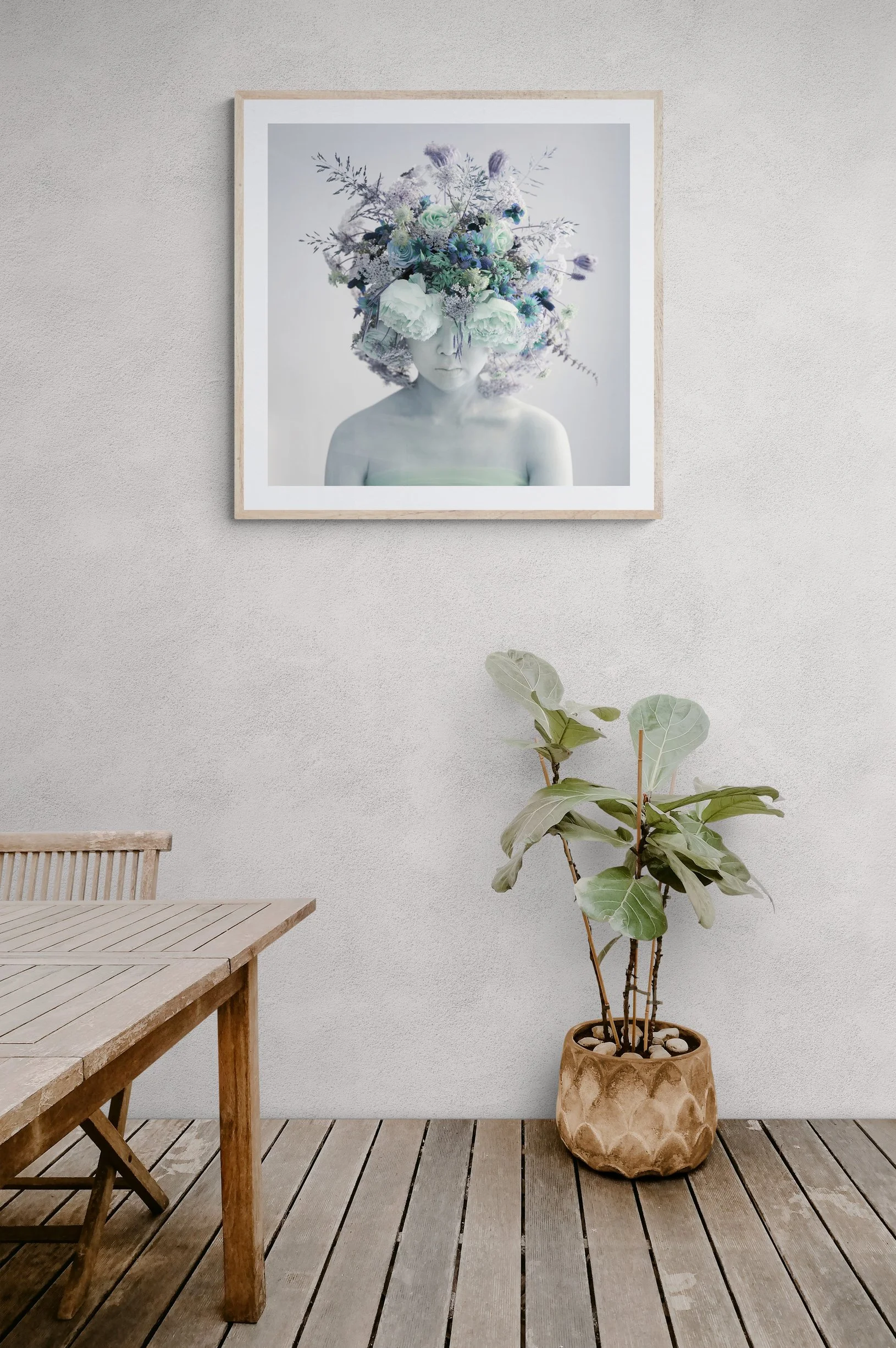Rustic_furniture_and_large_plant_on_wooden_deck.jpg