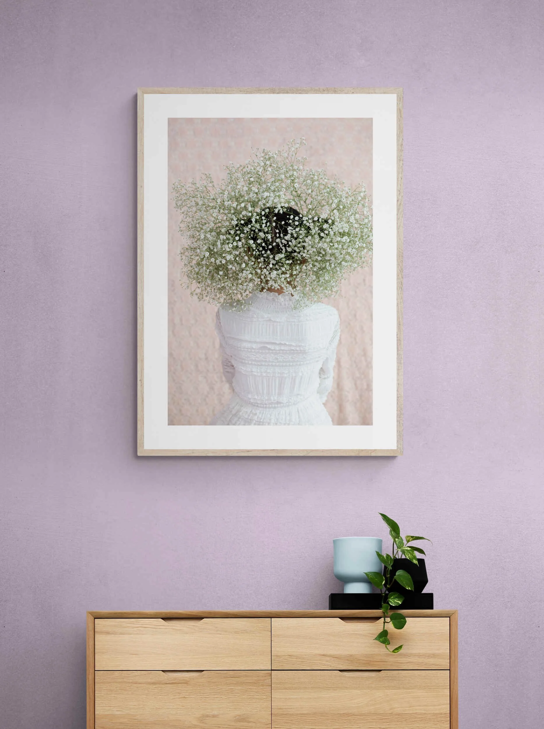 Modern_wood_cabinet_with_plant_and_vase (1).jpg