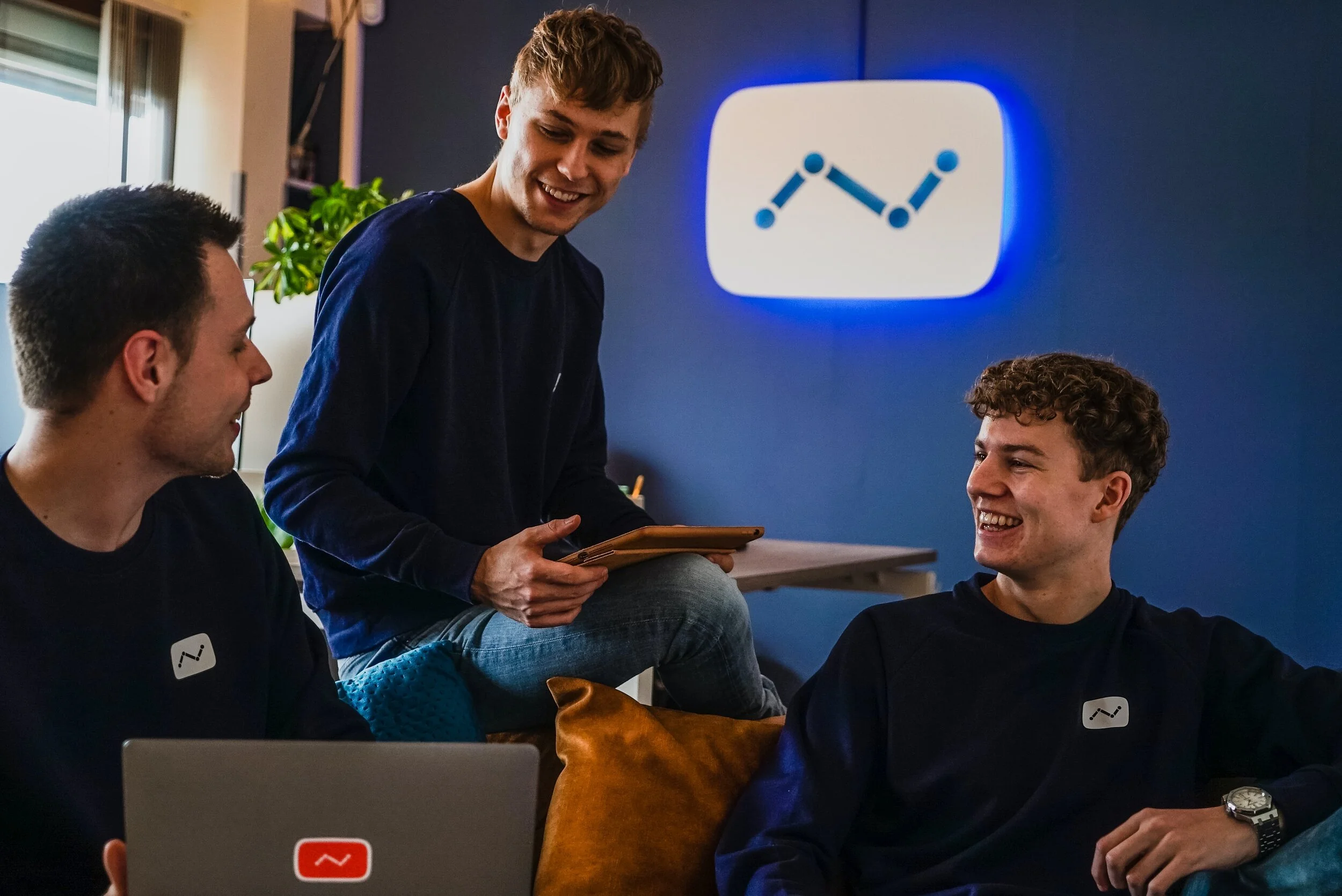 A team is talking about the impact of their work