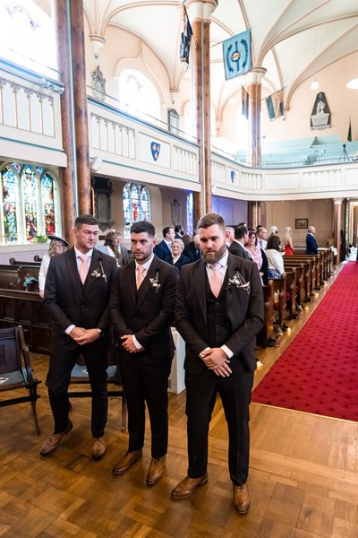 groom_groomsmen_church.jpg