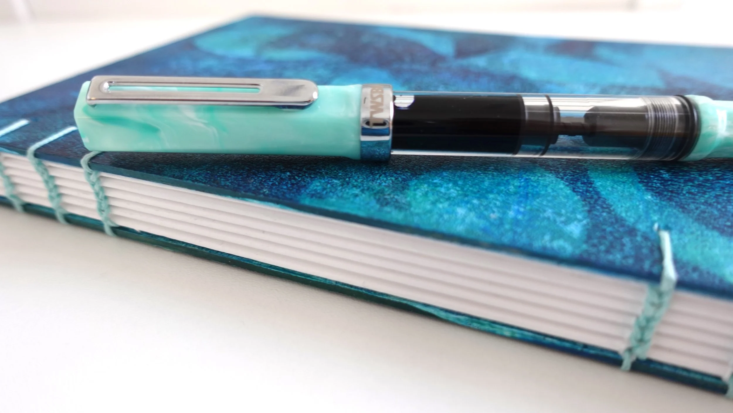 (sold) Hand bound sketchbooks - hand painted cover