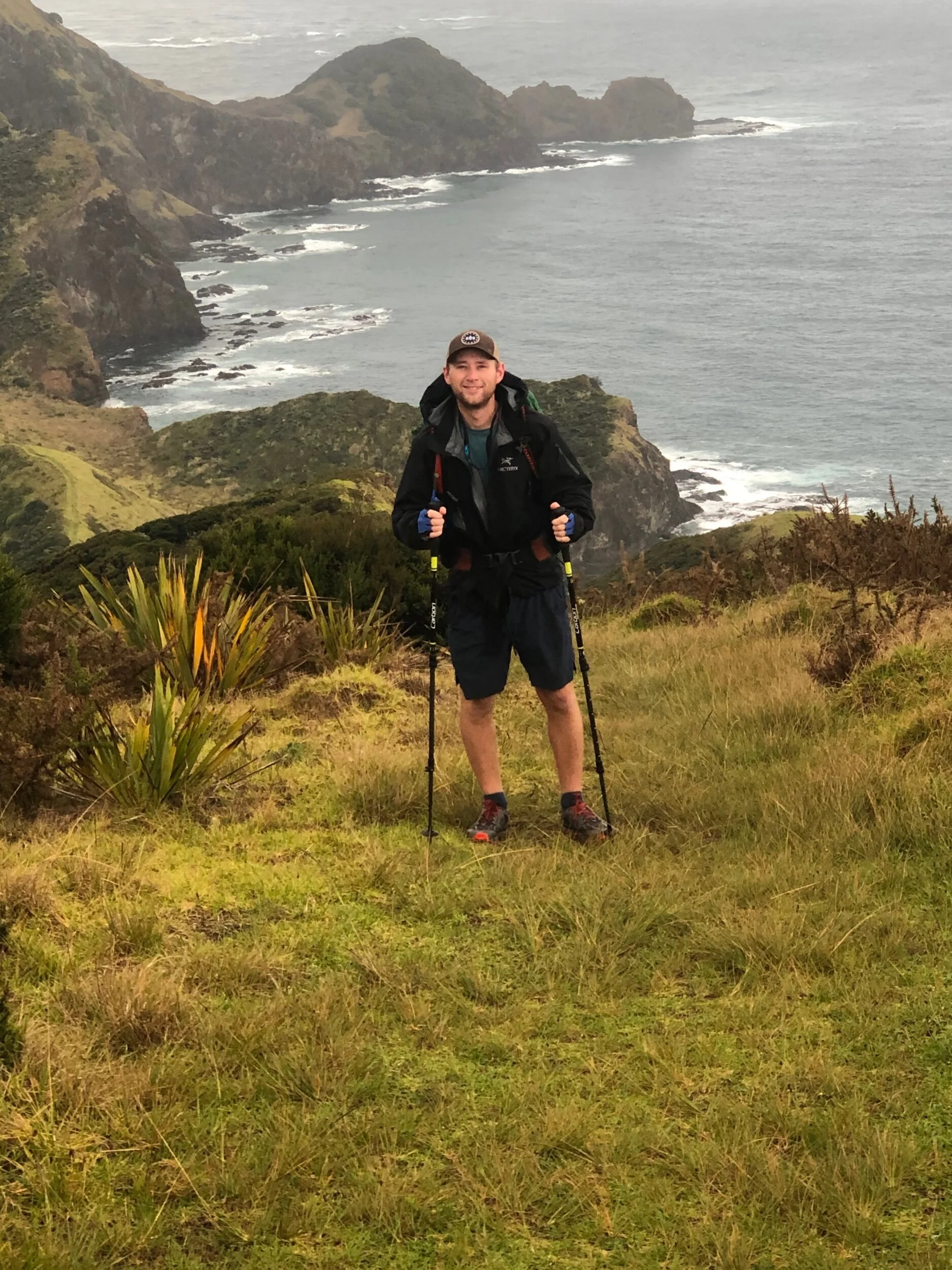 Alex puts on rain gear for the first time