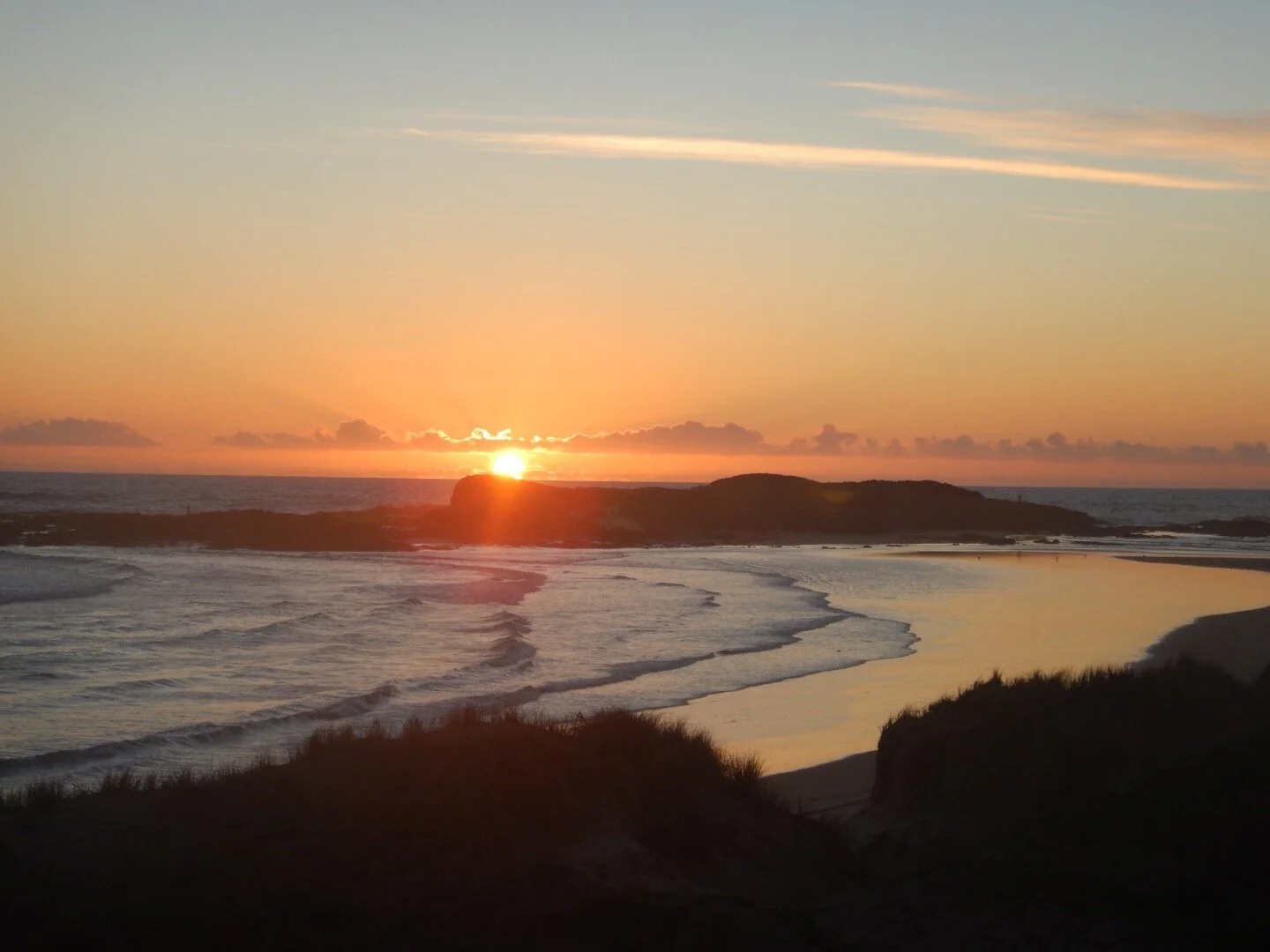 Sunset at Maunganui Bluff.