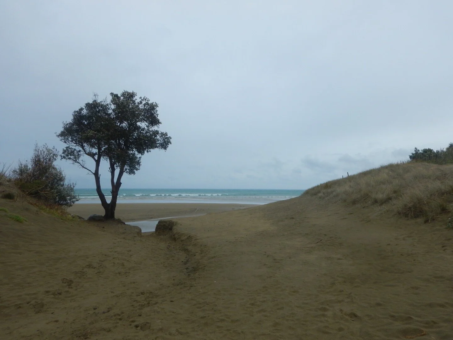 Ethan walking off 90 mile beach.