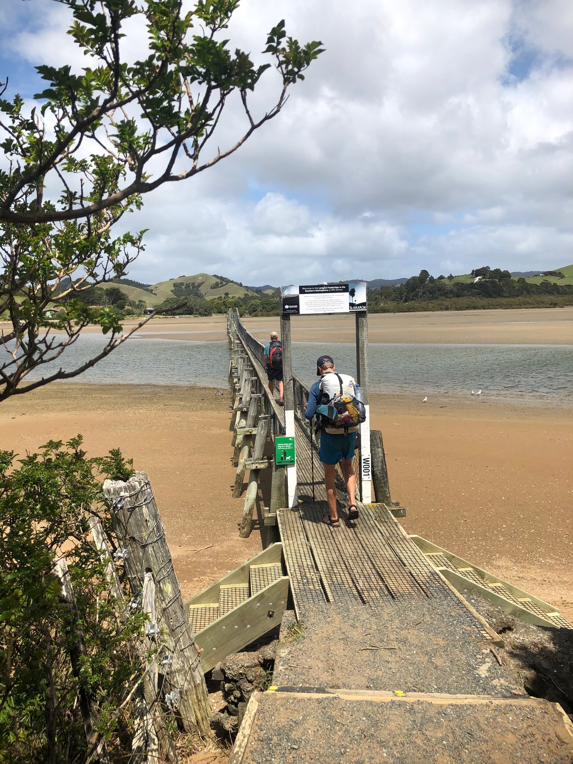 Phillip crossing the long footbridge