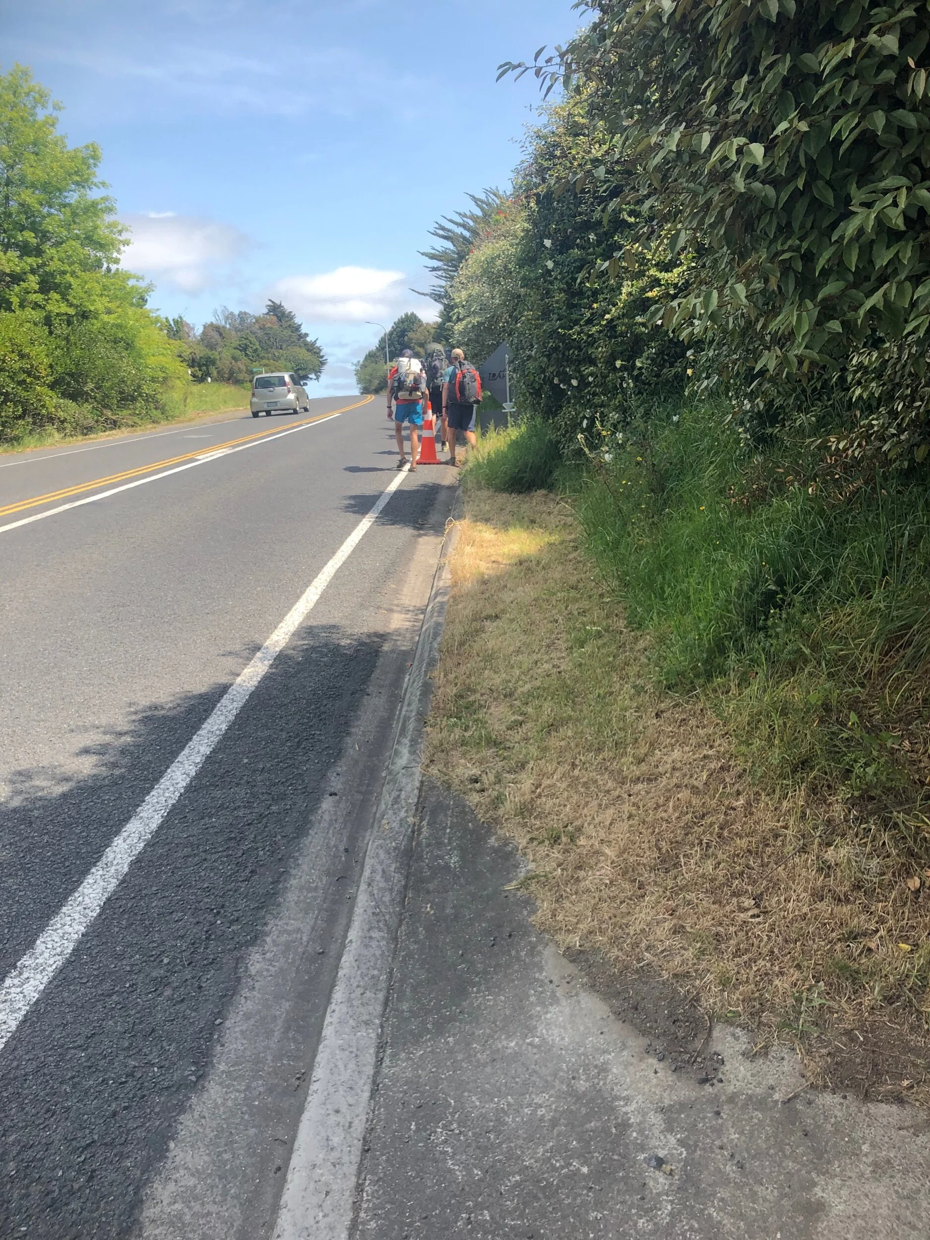 Walking alongside the highway… again