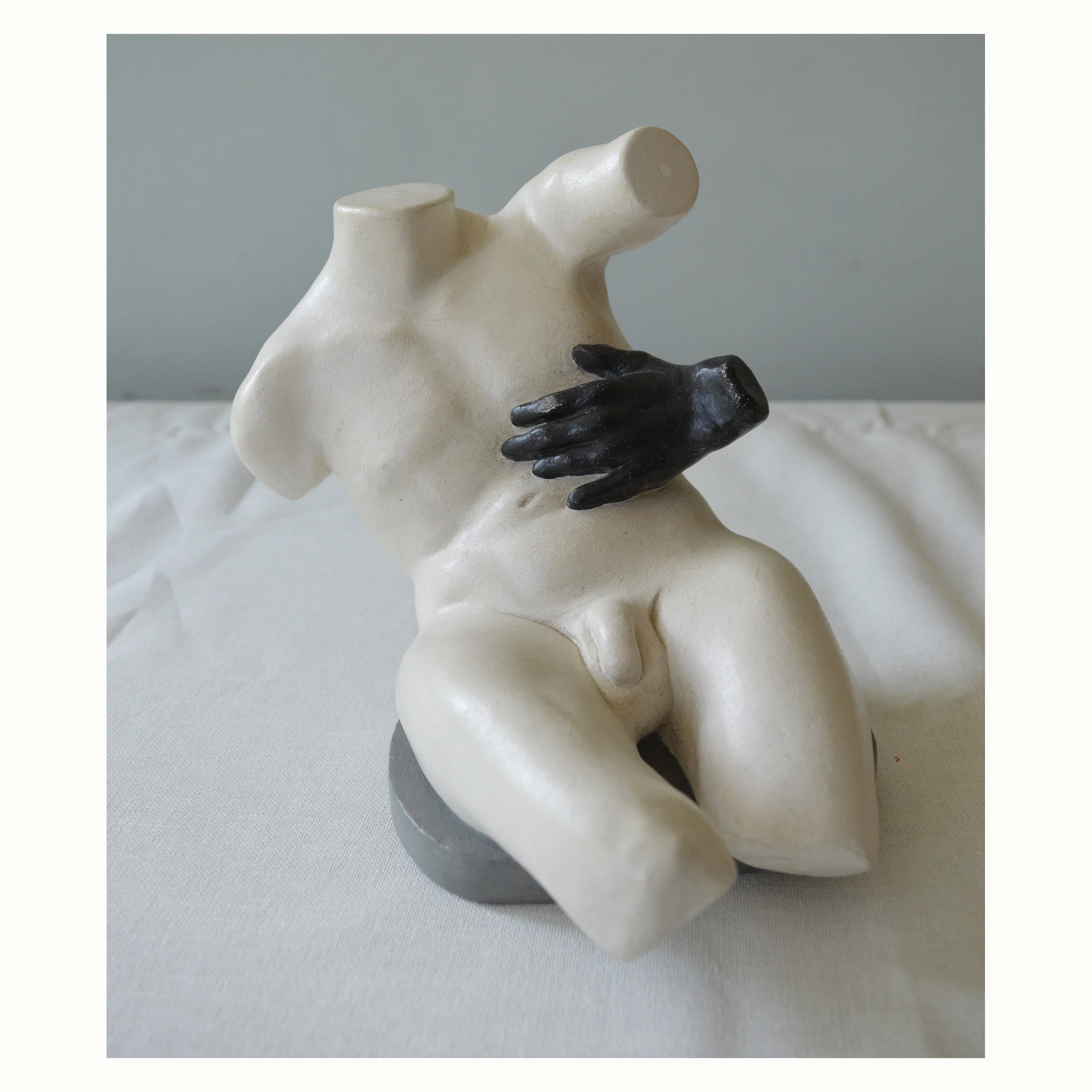 White figure with two hands